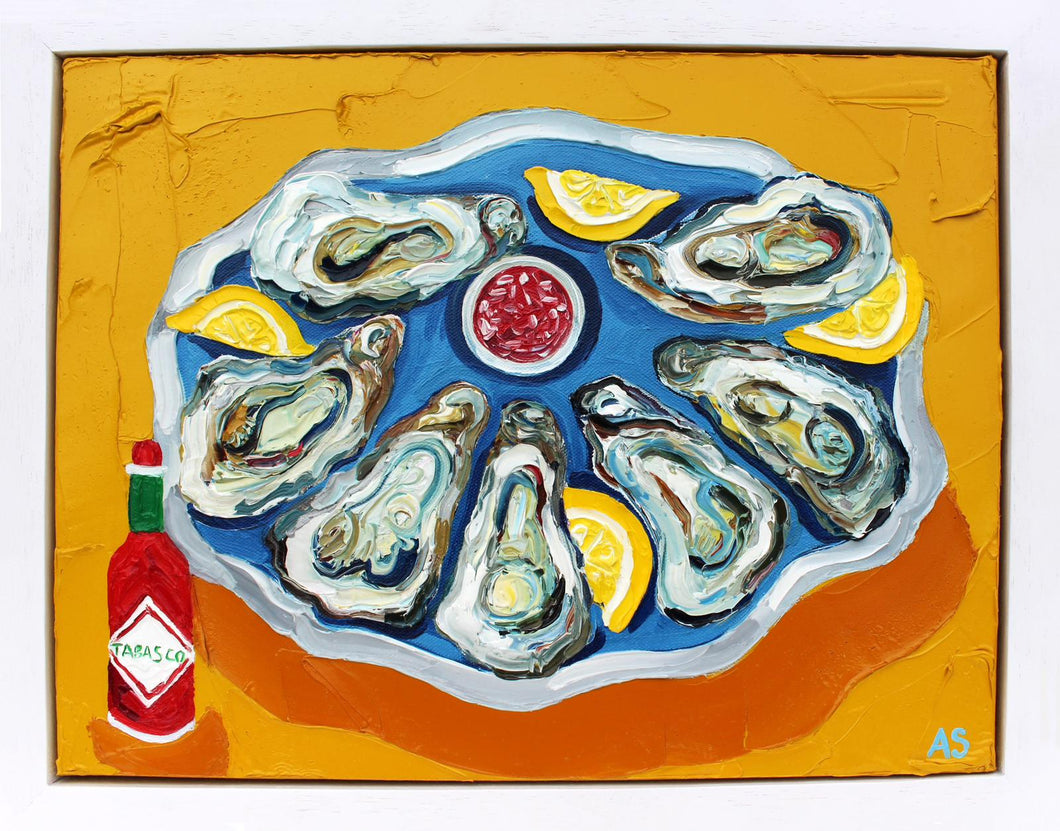 Oysters on a Plate with Tabasco Sauce
